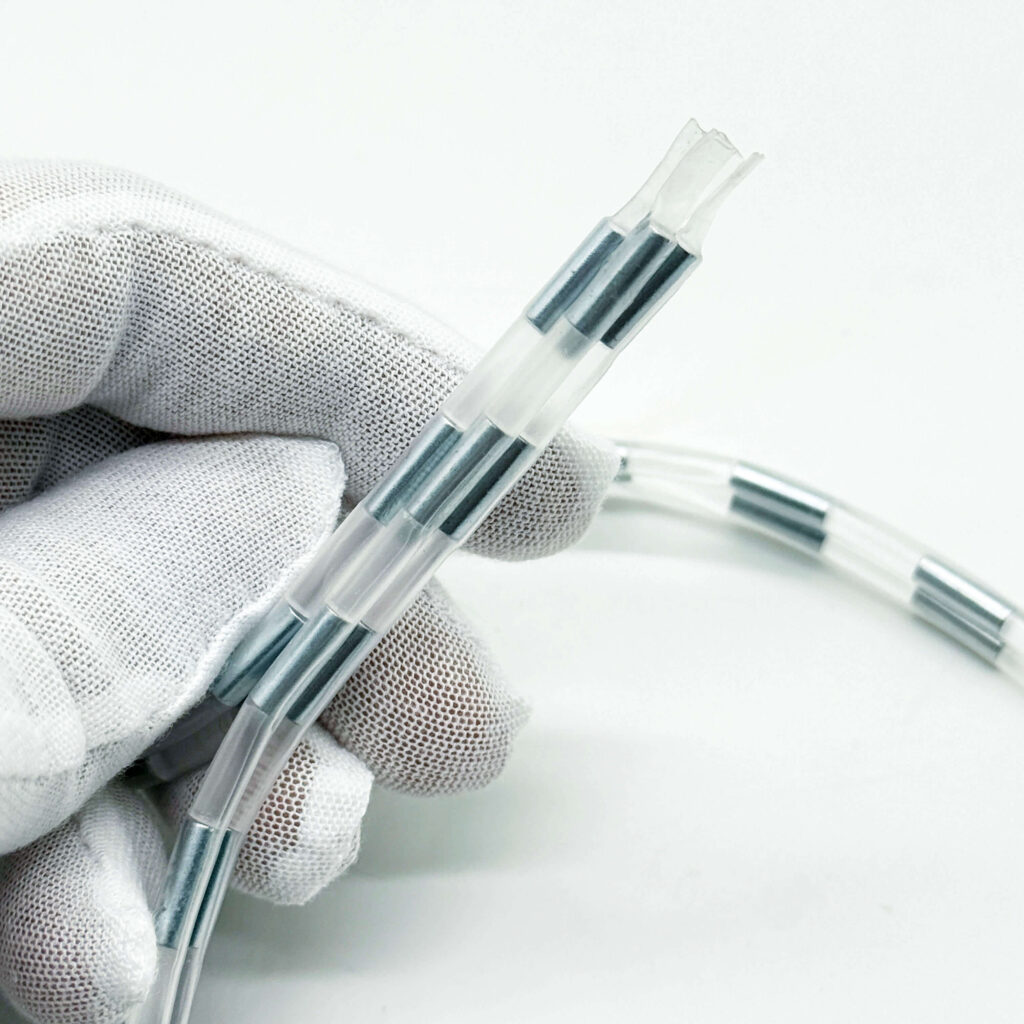 Flexible tube-encased NdFeB magnetic zipper strip HJ-089 held in gloved hand